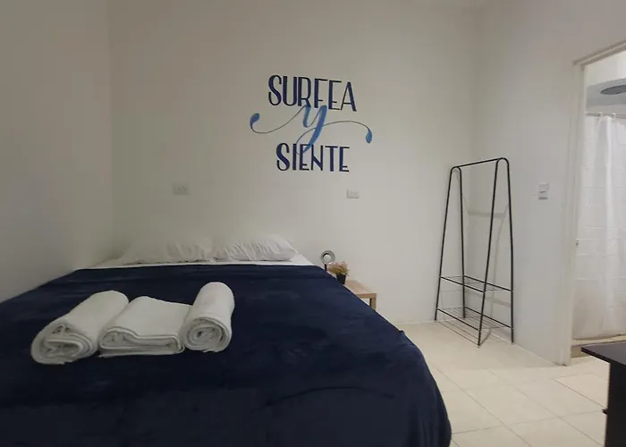 Surfo House & Hotel *